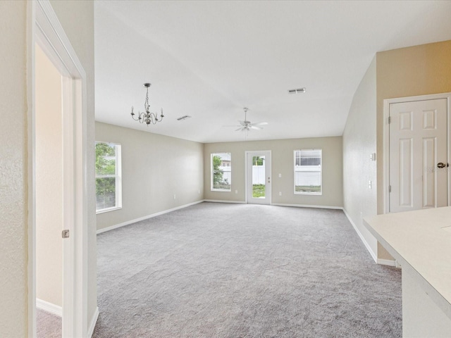 5048 Teather St, Spring Hill, FL 34608 - unfurnished living room featuring carpet floors, a chandelier, and plenty of natural light