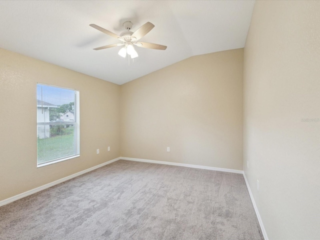 5048 Teather St, Spring Hill, FL 34608 - unfurnished room with carpet floors, lofted ceiling, and ceiling fan