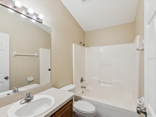 5048 Teather St, Spring Hill, FL 34608 - full bathroom featuring vanity, a textured wall, and bathing tub / shower combination