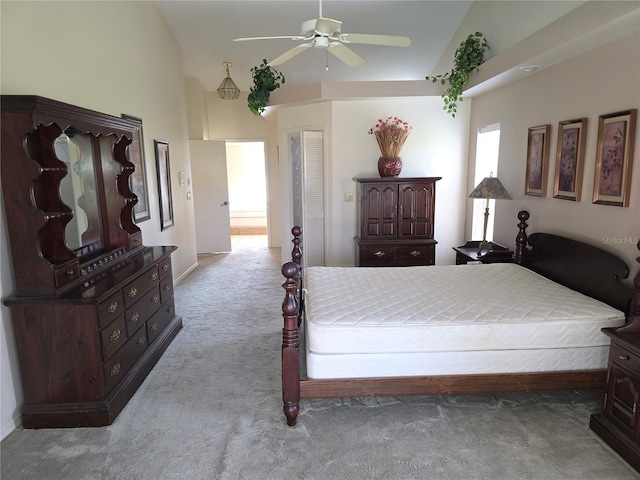 9168 Southern Comfort Ct, Weeki Wachee, FL 34613 - bedroom with carpet flooring, high vaulted ceiling, and a ceiling fan