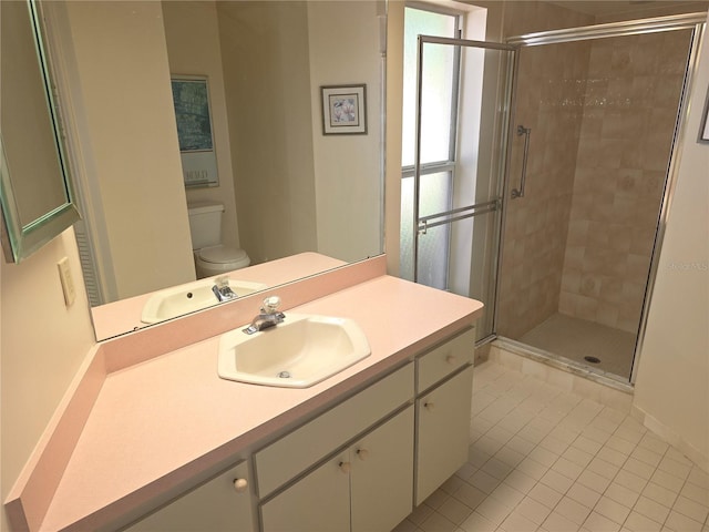 9168 Southern Comfort Ct, Weeki Wachee, FL 34613 - bathroom featuring tile patterned floors, a shower stall, and vanity