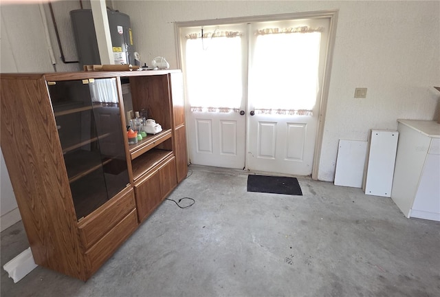 9168 Southern Comfort Ct, Weeki Wachee, FL 34613 - doorway to outside with concrete floors