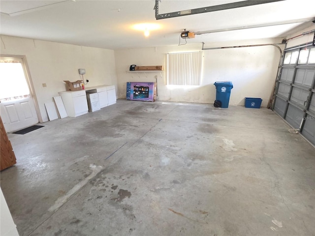 9168 Southern Comfort Ct, Weeki Wachee, FL 34613 - garage with a garage door opener