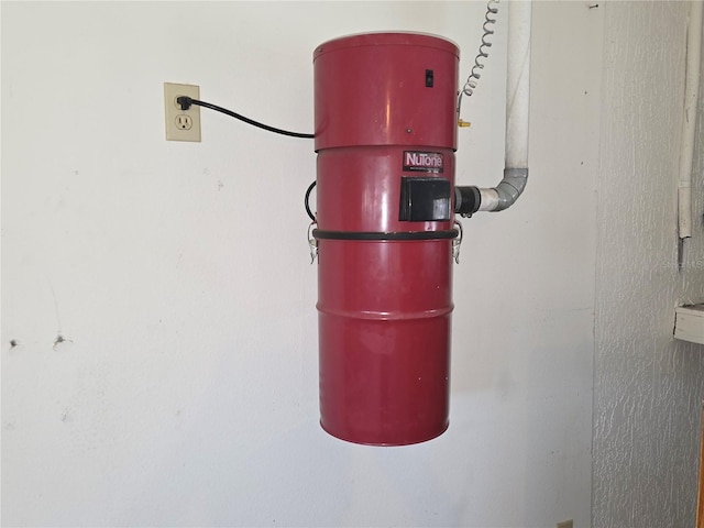 9168 Southern Comfort Ct, Weeki Wachee, FL 34613 - detailed view of a central vacuum unit