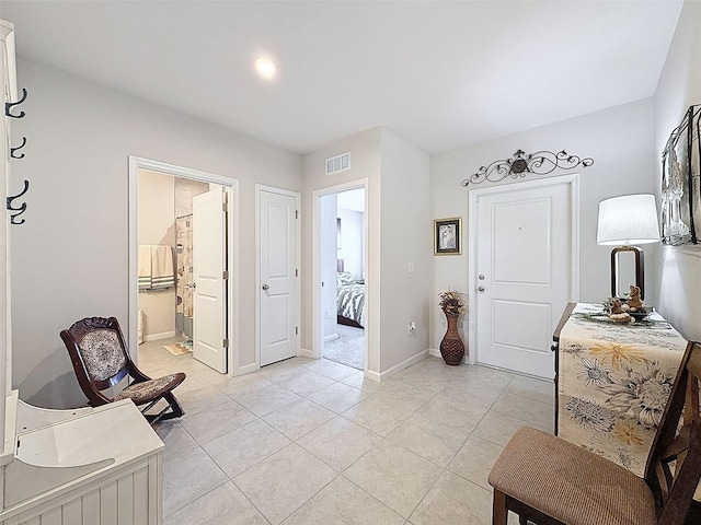 8855 Prairie Creek Dr, New Port Richey, FL 34655 - foyer with light tile patterned floors and baseboards