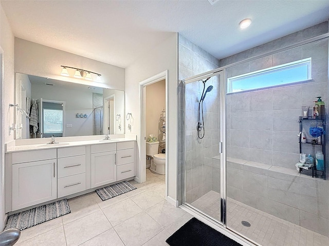 8855 Prairie Creek Dr, New Port Richey, FL 34655 - full bath featuring a stall shower, double vanity, and tile patterned floors