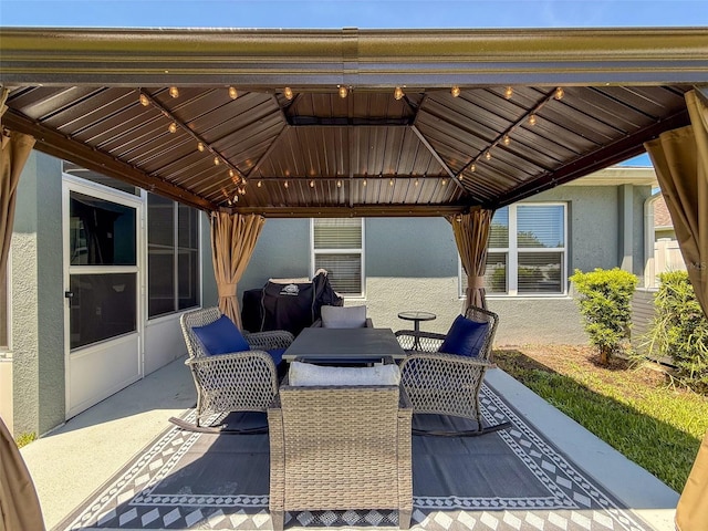 8855 Prairie Creek Dr, New Port Richey, FL 34655 - view of patio featuring a gazebo and outdoor dining area