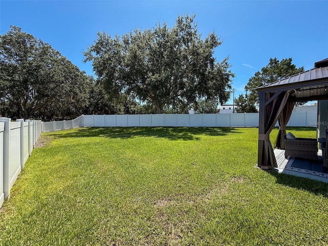8855 Prairie Creek Dr, New Port Richey, FL 34655 - fenced backyard featuring a gazebo