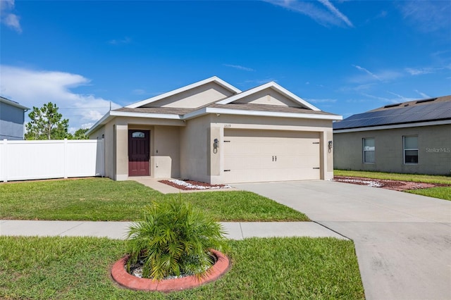 12119 Barnsley Reserve Pl, Gibsonton, FL 33534 - ranch-style home with stucco siding, an attached garage, and driveway