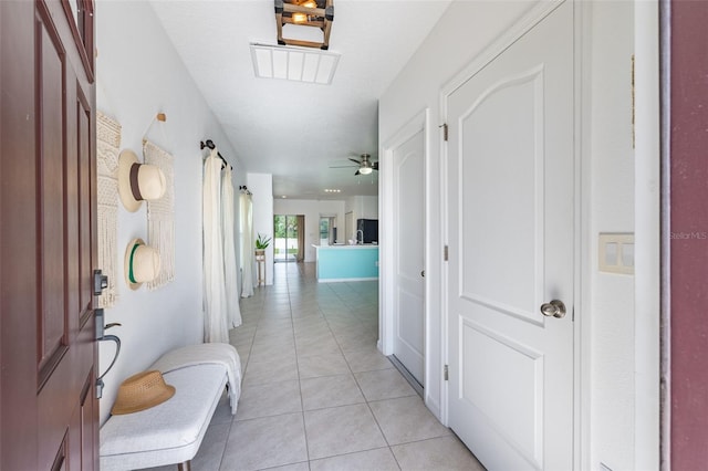 12119 Barnsley Reserve Pl, Gibsonton, FL 33534 - hall with light tile patterned floors
