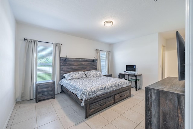 12119 Barnsley Reserve Pl, Gibsonton, FL 33534 - bedroom featuring multiple windows and light tile patterned floors