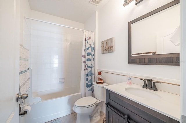 12119 Barnsley Reserve Pl, Gibsonton, FL 33534 - full bath featuring vanity, shower / bath combo with shower curtain, and wainscoting