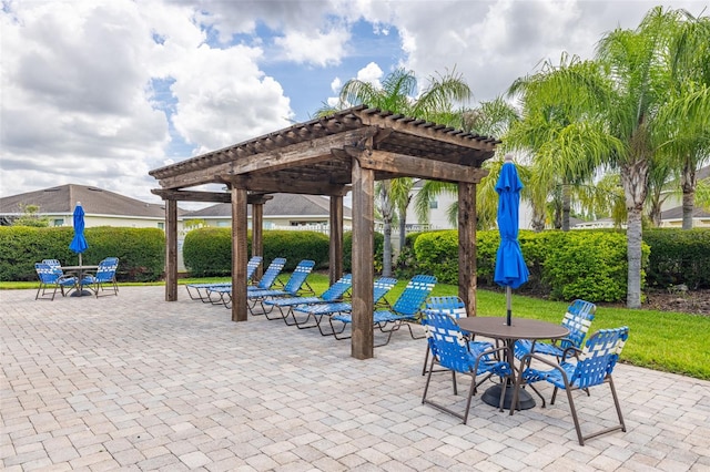 12119 Barnsley Reserve Pl, Gibsonton, FL 33534 - view of patio / terrace with a pergola and outdoor dining area