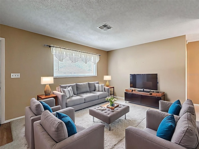 11094 Auburndale St, Spring Hill, FL 34609 - carpeted living room with a textured ceiling