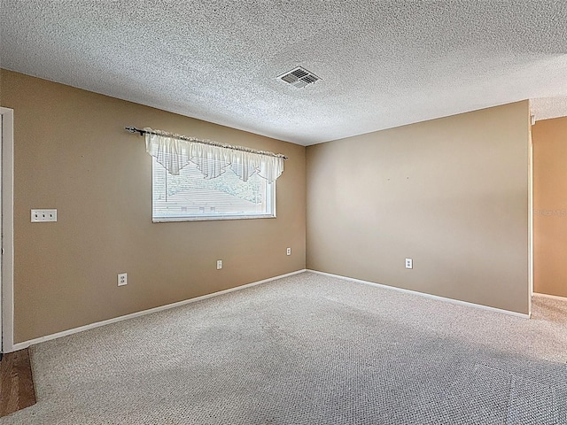 11094 Auburndale St, Spring Hill, FL 34609 - unfurnished room featuring carpet floors and a textured ceiling
