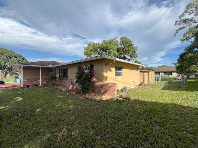 10458 Clingman St, Spring Hill, FL 34608 - view of property exterior with brick siding and stucco siding