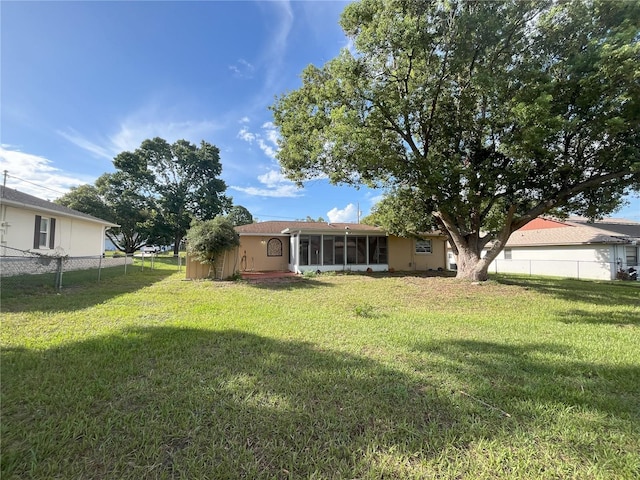 10458 Clingman St, Spring Hill, FL 34608 - view of yard featuring a sunroom