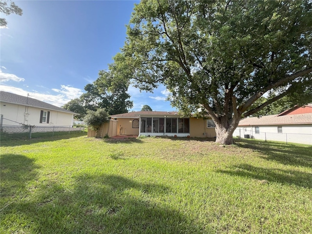 10458 Clingman St, Spring Hill, FL 34608 - rear view of property featuring a sunroom and stucco siding