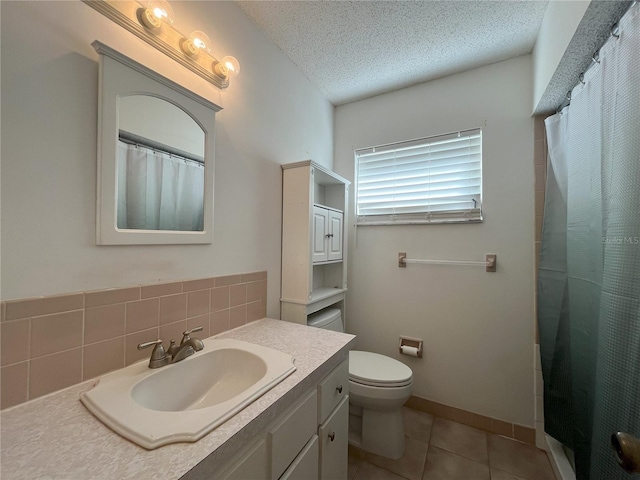 10458 Clingman St, Spring Hill, FL 34608 - bathroom with vanity, tile patterned flooring, a shower with shower curtain, and a textured ceiling