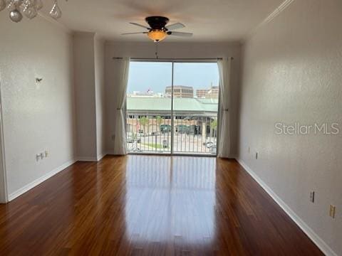 700 S Harbour Island Blvd Unit 407, Tampa, FL 33602 - empty room featuring ceiling fan, wood finished floors, and ornamental molding