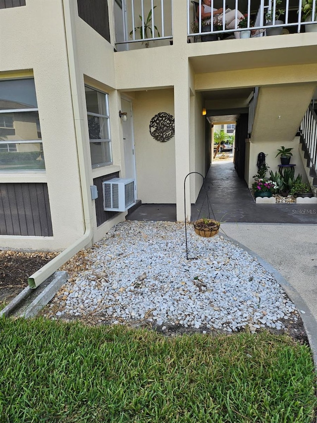 4743 Jasper Dr Unit 107, New Port Richey, FL 34652 - view of exterior entry featuring stucco siding