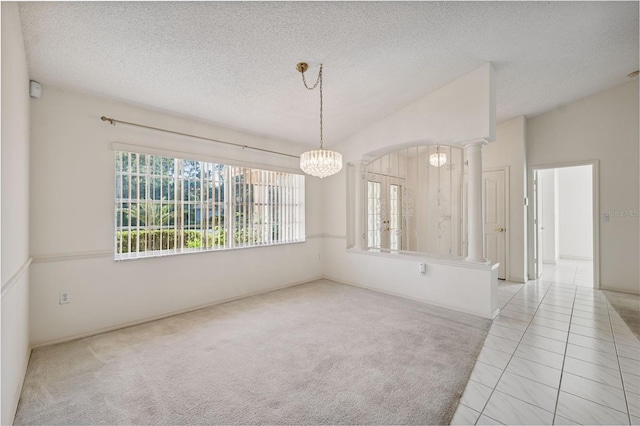 10394 Ireland St, Spring Hill, FL 34608 - unfurnished dining area with a chandelier, plenty of natural light, carpet, a textured ceiling, and tile patterned flooring