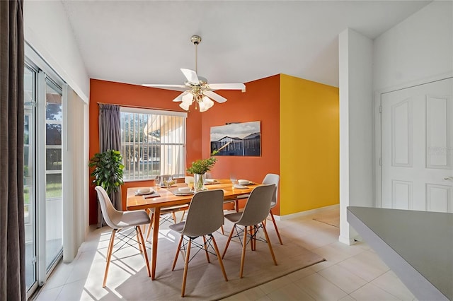 10394 Ireland St, Spring Hill, FL 34608 - dining room with light tile patterned floors and a ceiling fan