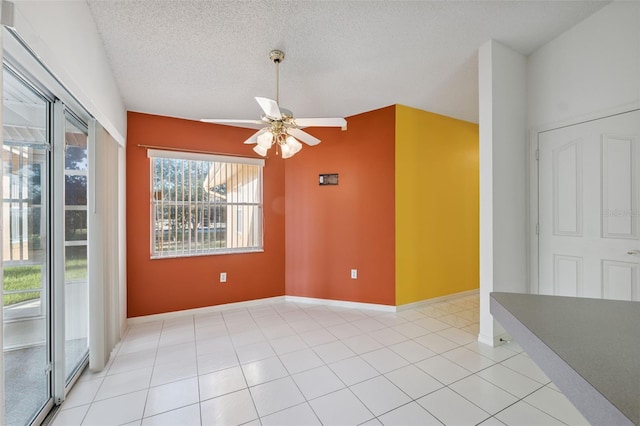 10394 Ireland St, Spring Hill, FL 34608 - unfurnished room featuring a ceiling fan, a textured ceiling, and light tile patterned floors