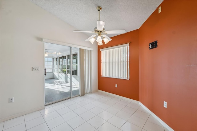 10394 Ireland St, Spring Hill, FL 34608 - tiled spare room featuring ceiling fan and a textured ceiling