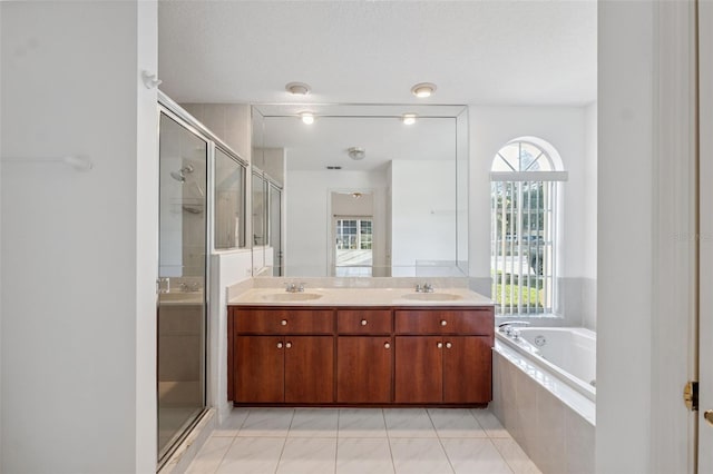10394 Ireland St, Spring Hill, FL 34608 - full bath with a shower stall, a bath, and double vanity