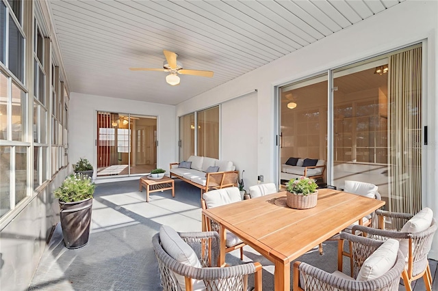 10394 Ireland St, Spring Hill, FL 34608 - sunroom featuring ceiling fan, outdoor lounge area, and outdoor dining area