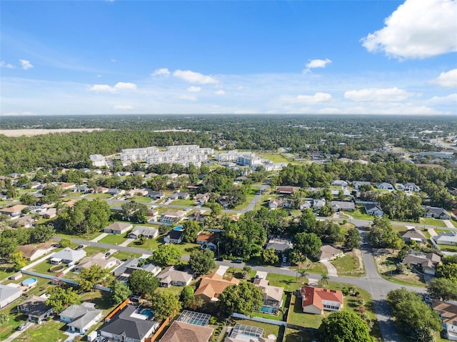 10394 Ireland St, Spring Hill, FL 34608 - aerial view of property and surrounding area with nearby suburban area