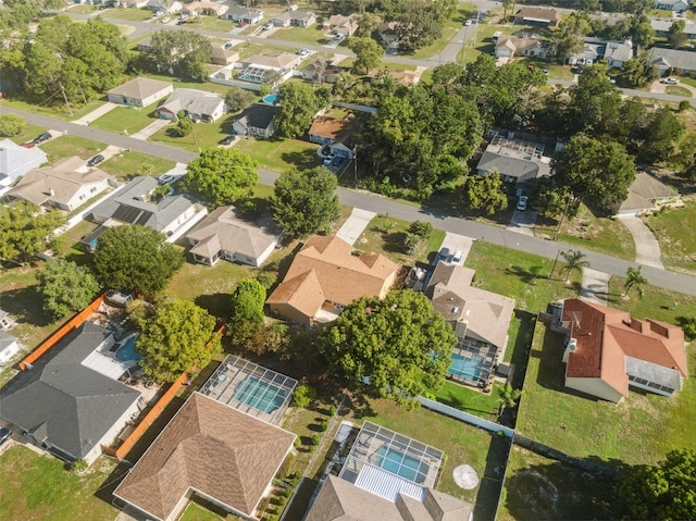 10394 Ireland St, Spring Hill, FL 34608 - aerial view of property and surrounding area featuring nearby suburban area