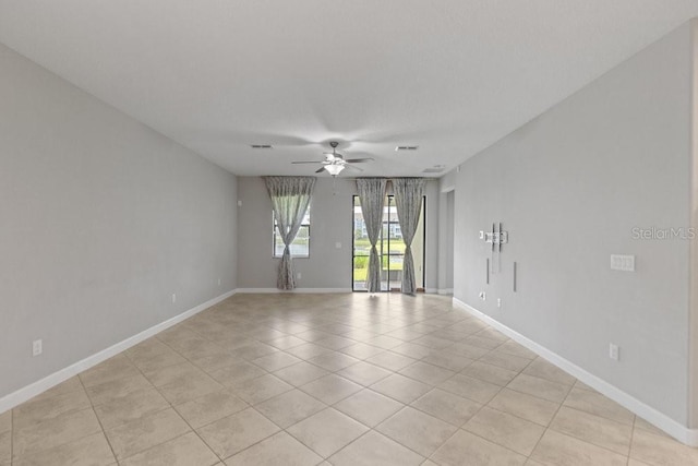 16874 Balance Cv, Land O Lakes, FL 34638 - unfurnished room featuring ceiling fan and light tile patterned floors