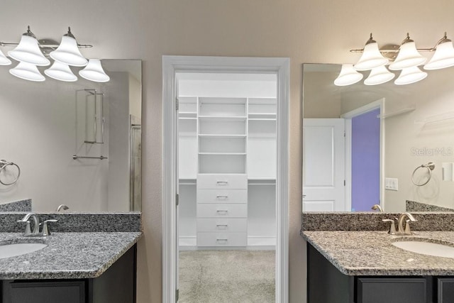 16874 Balance Cv, Land O Lakes, FL 34638 - bathroom with a spacious closet and two vanities