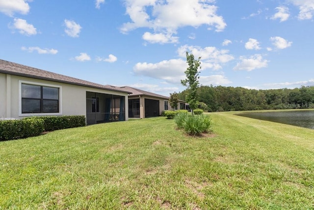 16874 Balance Cv, Land O Lakes, FL 34638 - view of green lawn featuring a water view