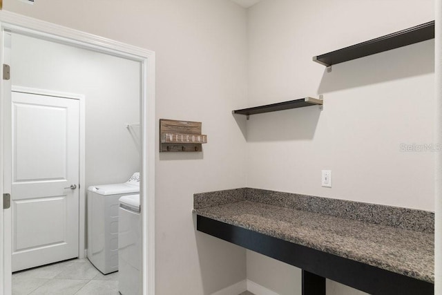 16874 Balance Cv, Land O Lakes, FL 34638 - laundry area featuring washer and clothes dryer and light tile patterned flooring