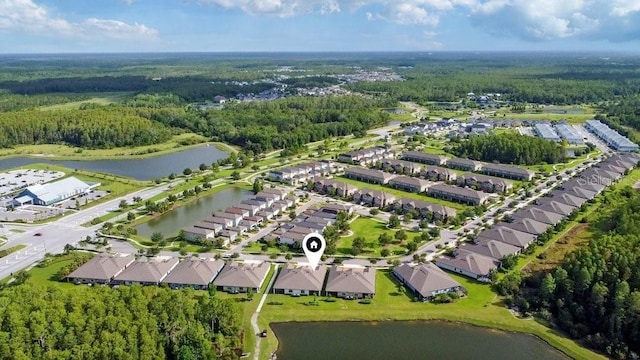 16874 Balance Cv, Land O Lakes, FL 34638 - aerial overview of property's location featuring a forest and nearby suburban area