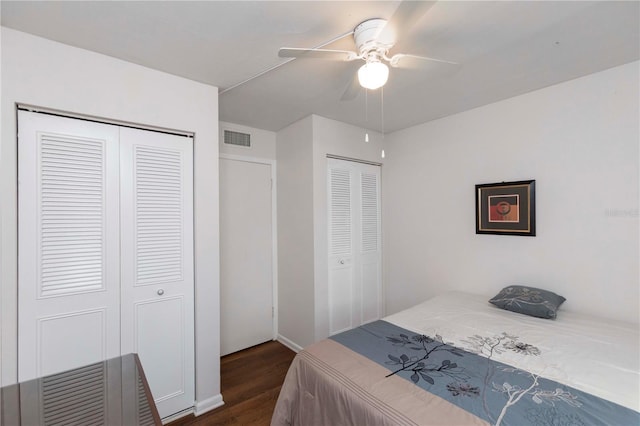 3153 Lake Pine Way Unit A1, Tarpon Springs, FL 34688 - bedroom featuring dark wood-type flooring and ceiling fan
