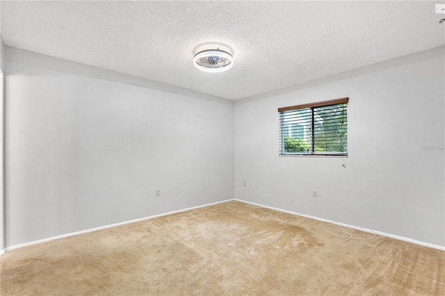 7700 Danube Dr Unit 7700, Hudson, FL 34667 - empty room with carpet and a textured ceiling