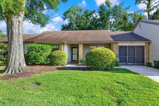 6654 Brambleleaf Dr, Spring Hill, FL 34606 - single story home with a front lawn, an attached garage, driveway, and stucco siding