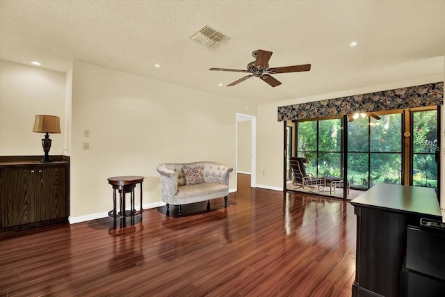 6654 Brambleleaf Dr, Spring Hill, FL 34606 - living area with wood finished floors, ceiling fan, recessed lighting, and a textured ceiling