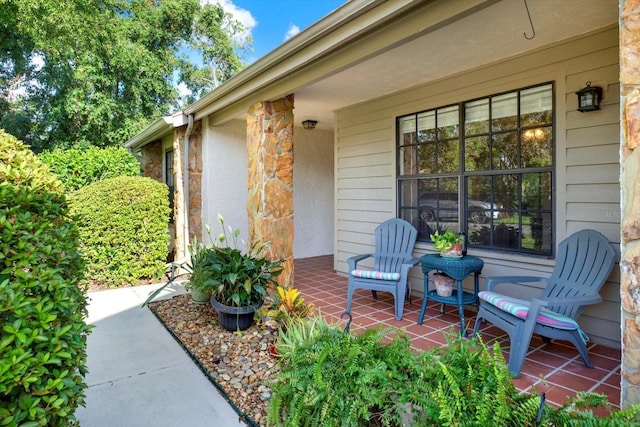 6654 Brambleleaf Dr, Spring Hill, FL 34606 - view of covered porch