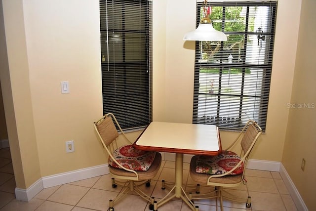 6575 Brambleleaf Dr, Spring Hill, FL 34606 - dining space with tile patterned floors and baseboards
