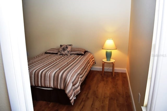 6575 Brambleleaf Dr, Spring Hill, FL 34606 - bedroom featuring wood finished floors