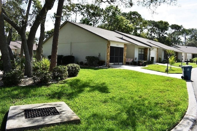 6575 Brambleleaf Dr, Spring Hill, FL 34606 - view of front facade with a front lawn