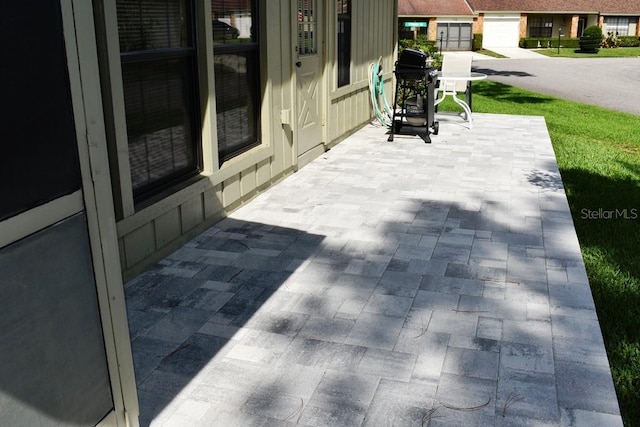 6575 Brambleleaf Dr, Spring Hill, FL 34606 - view of patio / terrace featuring a grill