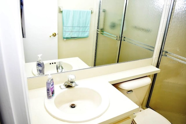 6575 Brambleleaf Dr, Spring Hill, FL 34606 - bathroom with vanity and a shower stall