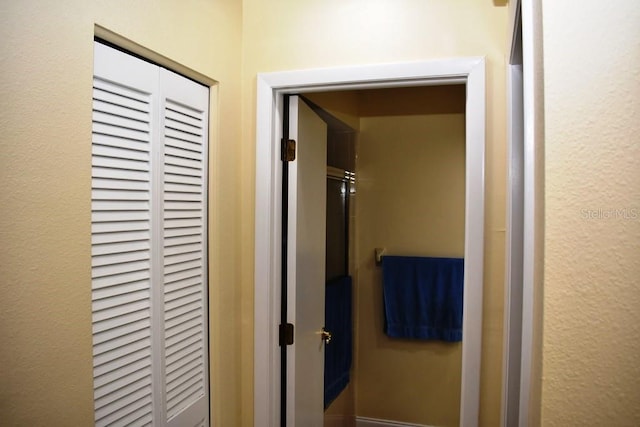 6575 Brambleleaf Dr, Spring Hill, FL 34606 - corridor with a textured wall
