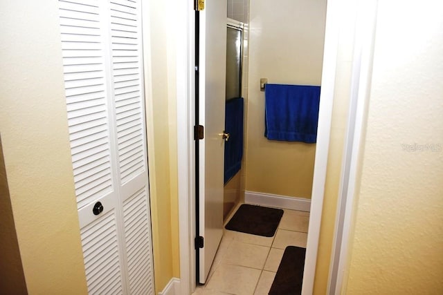 6575 Brambleleaf Dr, Spring Hill, FL 34606 - full bath featuring a closet, tile patterned flooring, and an enclosed shower